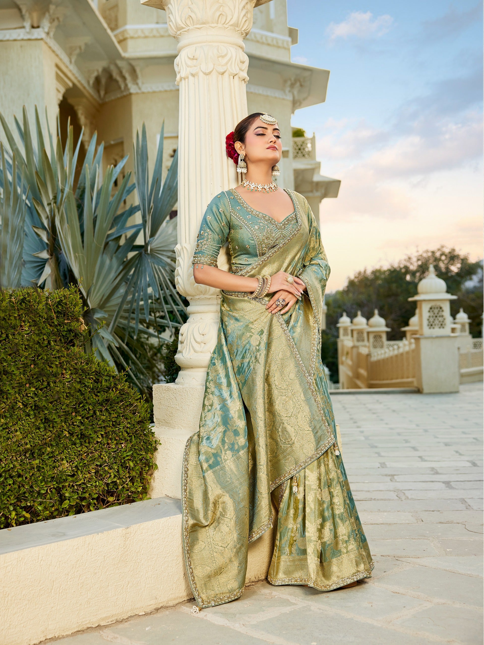 Sea green viscose silk wedding saree with gold zari woven border and pallu