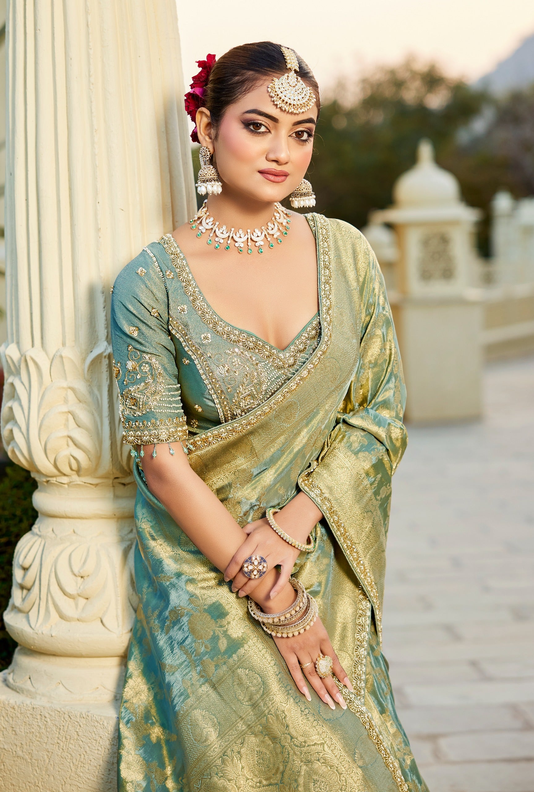 Sea green viscose silk wedding saree with gold zari woven border and pallu